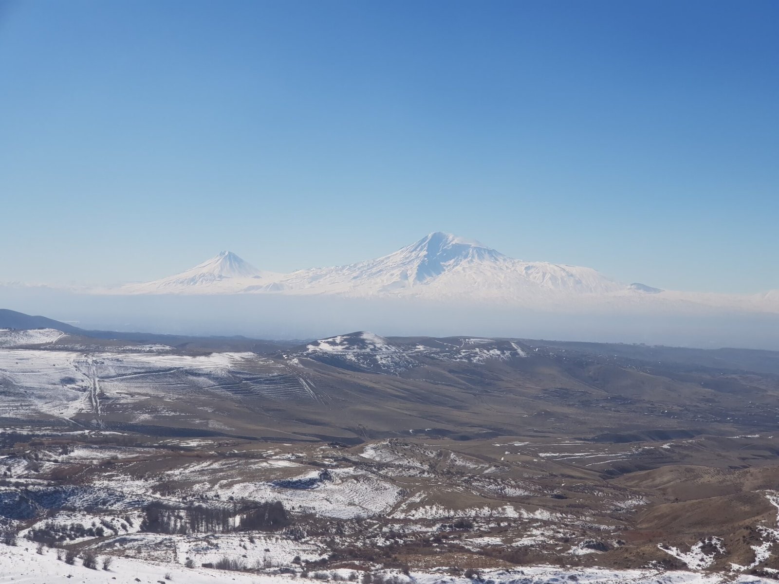 Mount Ararat surrounded by snow-covered fields in Armenia