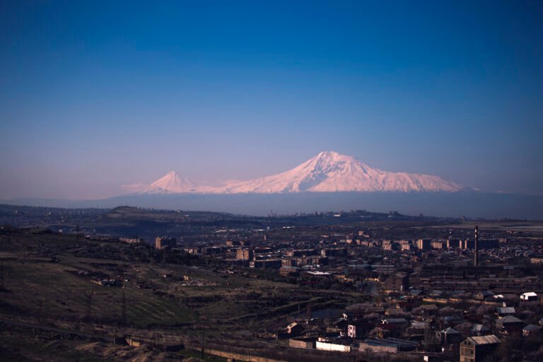 Mount Ararat rising above a village in the Ararat plain of Armenia