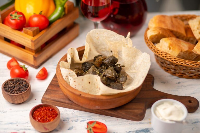 Stuffed vine leaves served with lavash flatbread