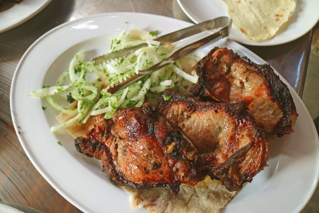 A plate of Armenian khorovats barbecue served on lavash flatbread