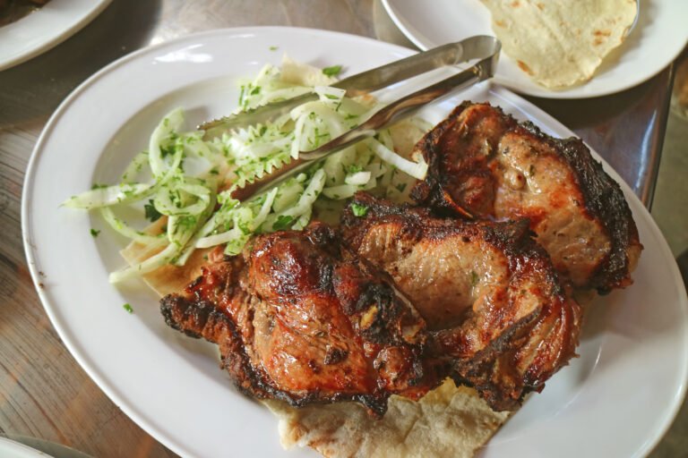 A plate of Armenian khorovats barbecue served on lavash flatbread