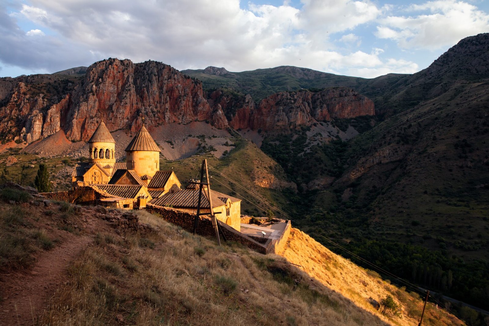 An Armenian monastery set in a wide mountain landscape